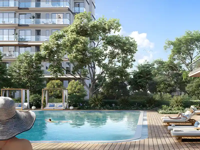Resort-style outdoor swimming pool and lounging deck at Emaar Serenity Hills New Gurgaon